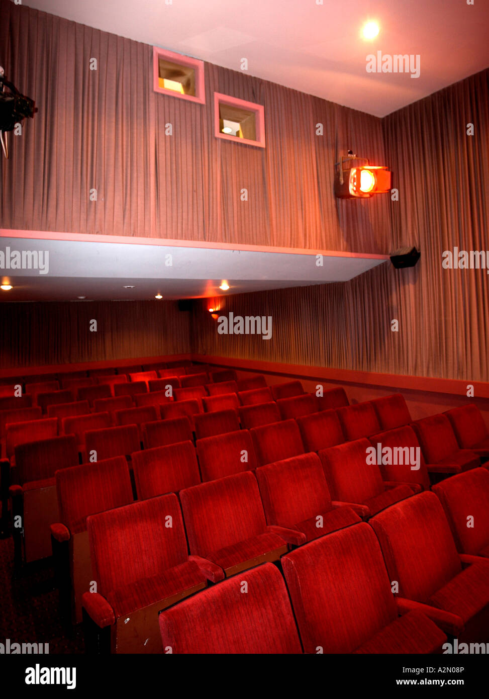 Royalty Cinema inside projection room & projectionist & projector Stock