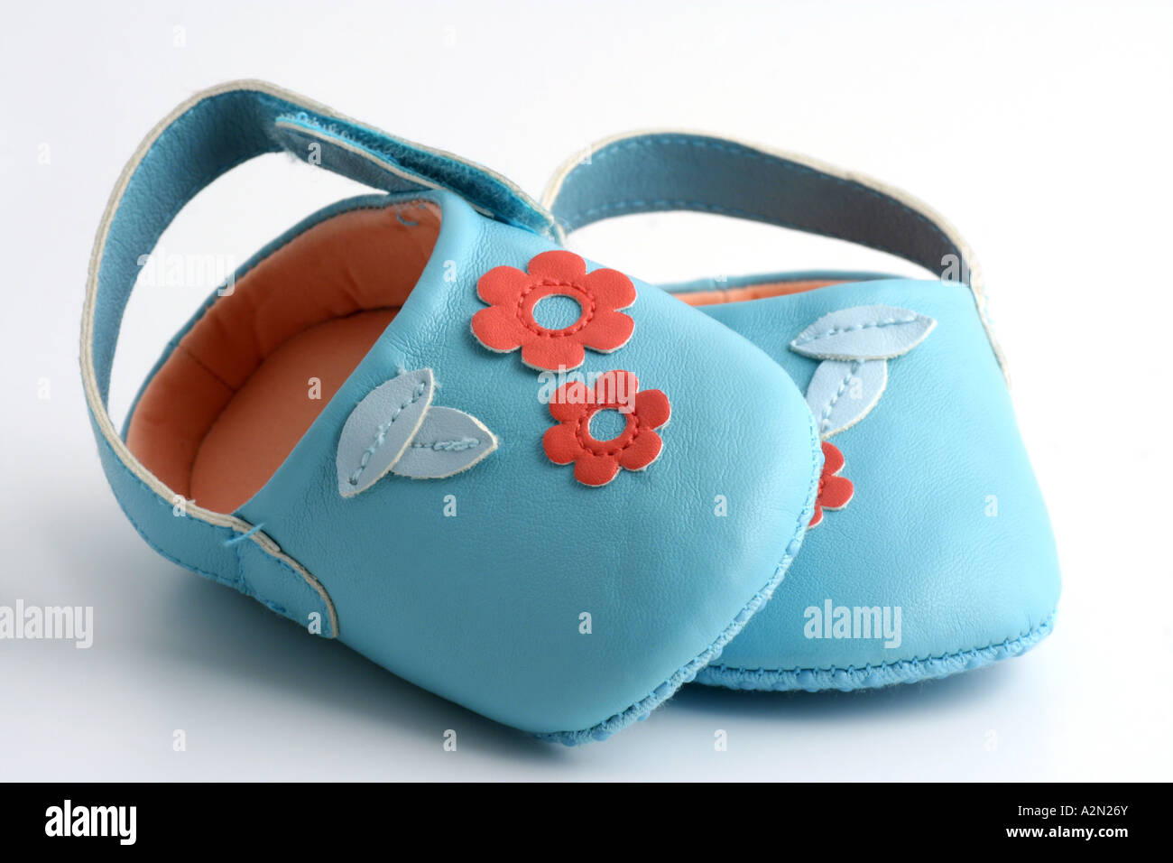 Pair of baby girls turquoise leather shoes. Stock Photo