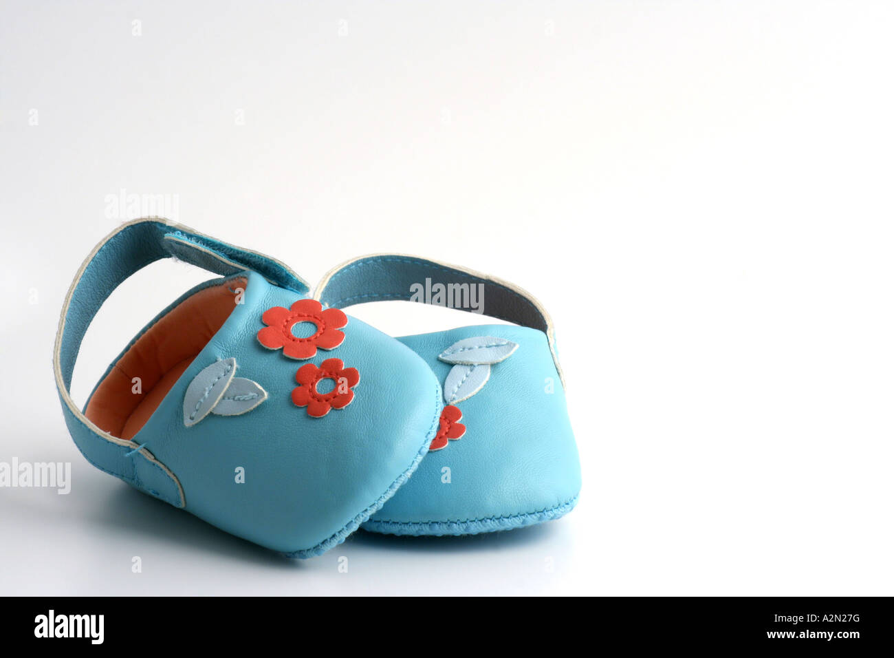 Pair of baby girls turquoise shoes. Stock Photo