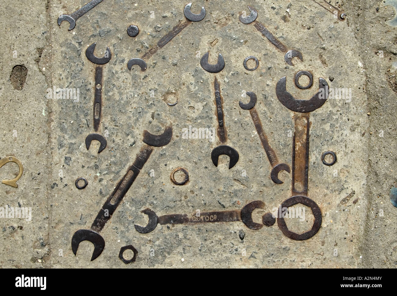 Embedded spanners at a recycling center in Tasmania Stock Photo - Alamy