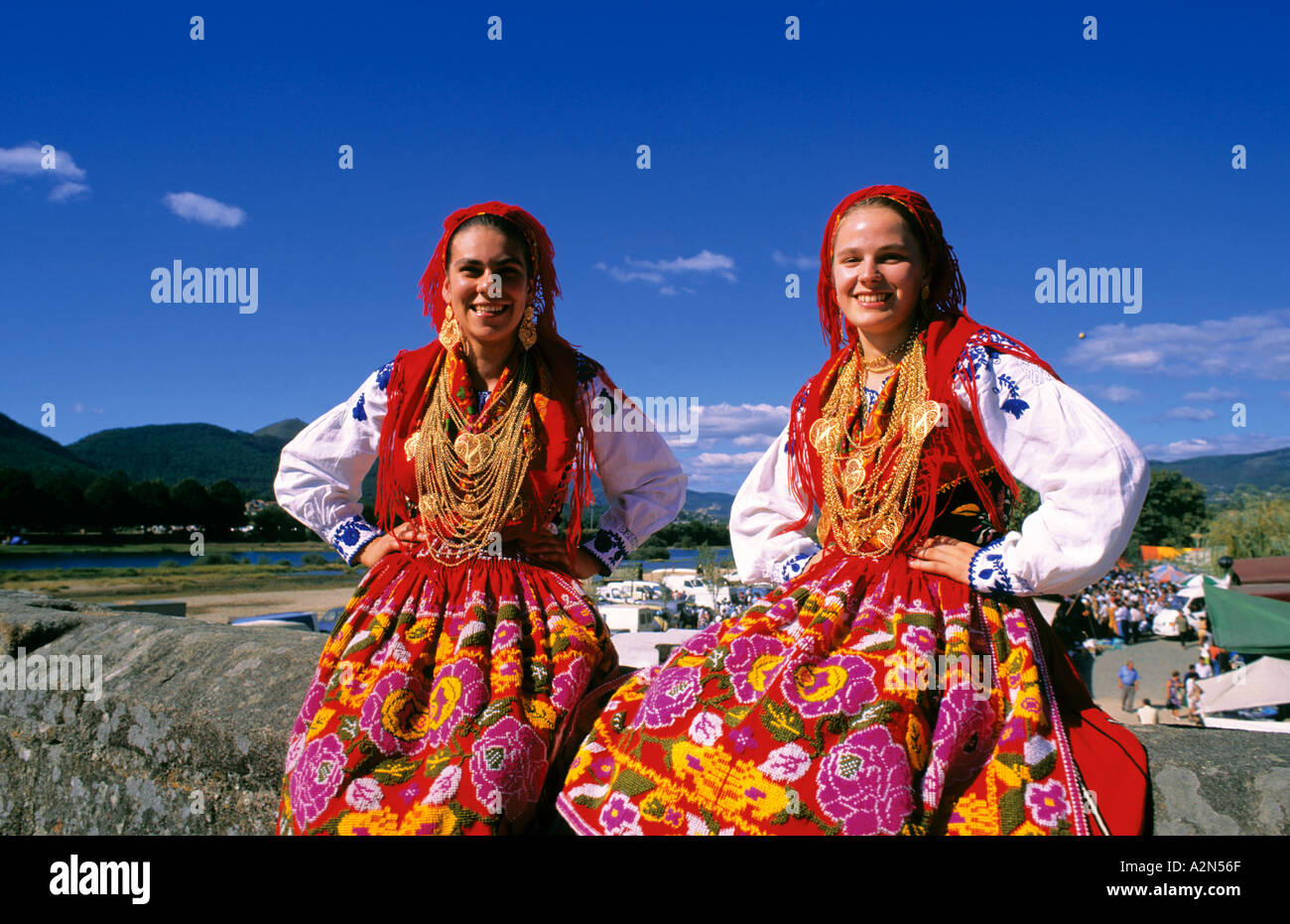 Girls with traditional costumes at the folklore festival Feiras Novas,  Ponte de Lima, Minho, Portugal Stock Photo