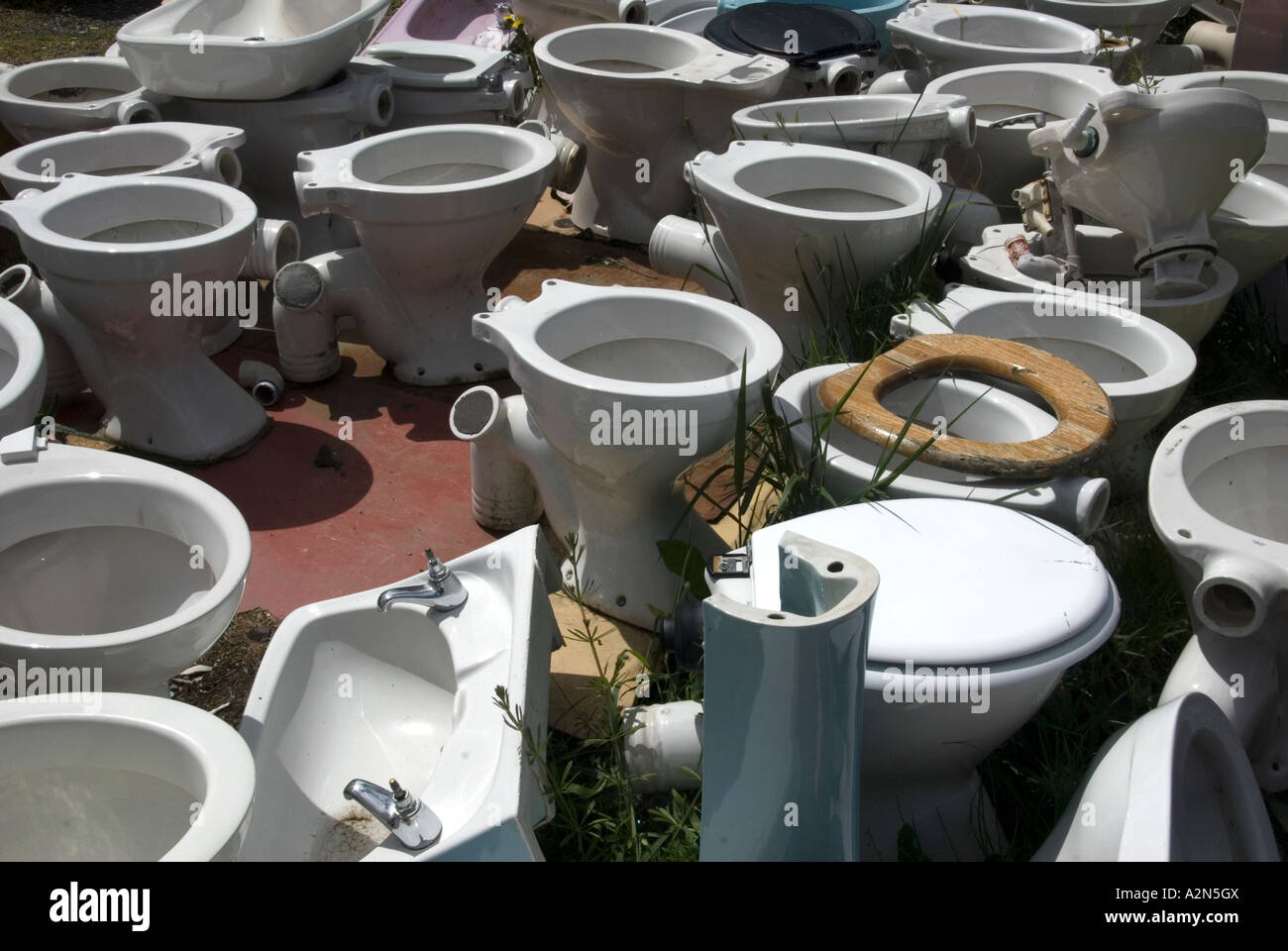 Second hand toilets for sale at a Tasmanian "Tip Shop Stock Photo Alamy