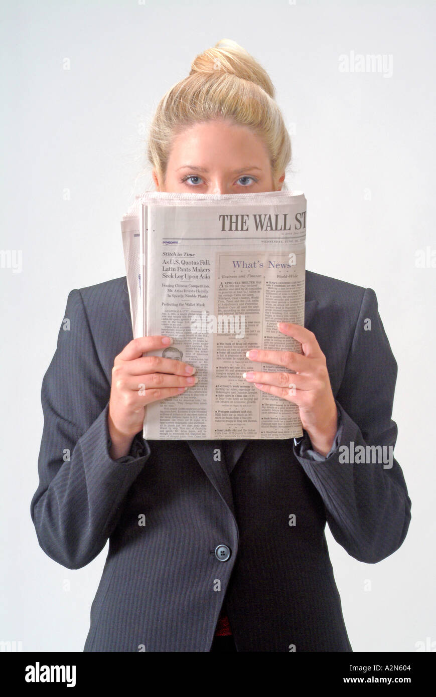 Woman in business suit on white background Stock Photo - Alamy