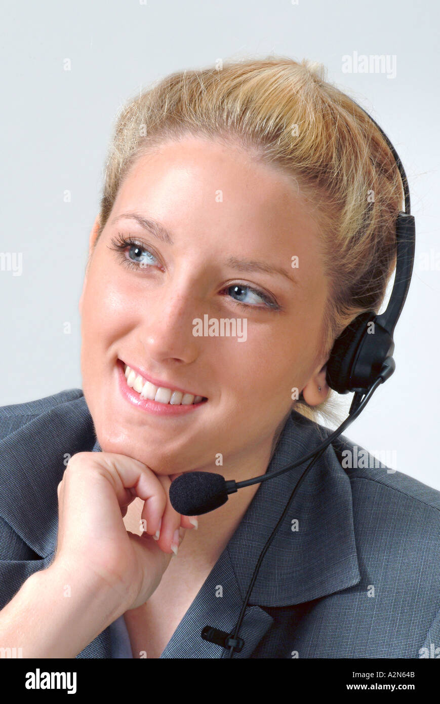Woman in business suit on white background Stock Photo - Alamy