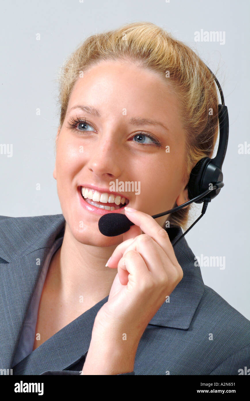 Woman in business suit on white background Stock Photo - Alamy
