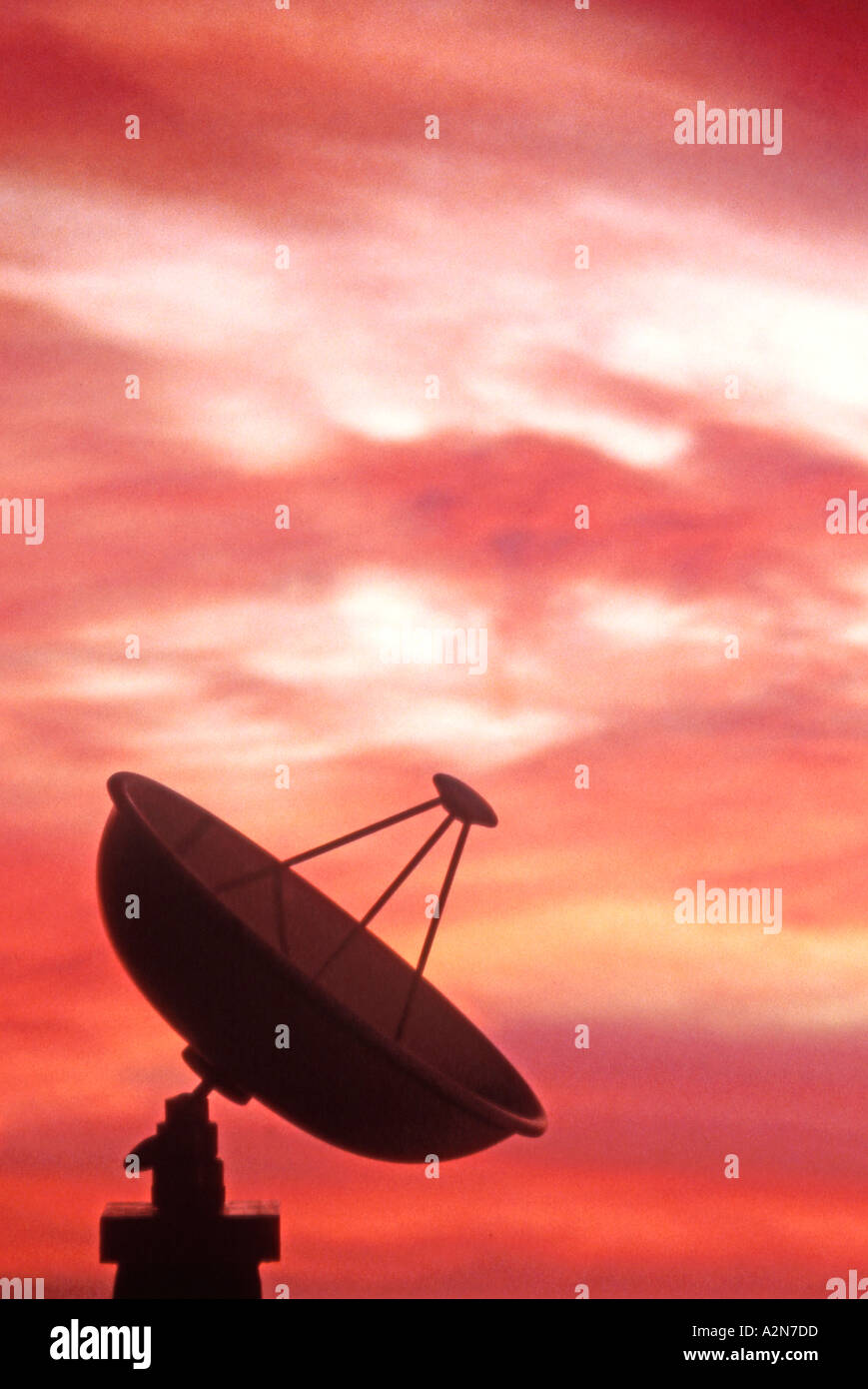 Satellite dish at sunset Stock Photo