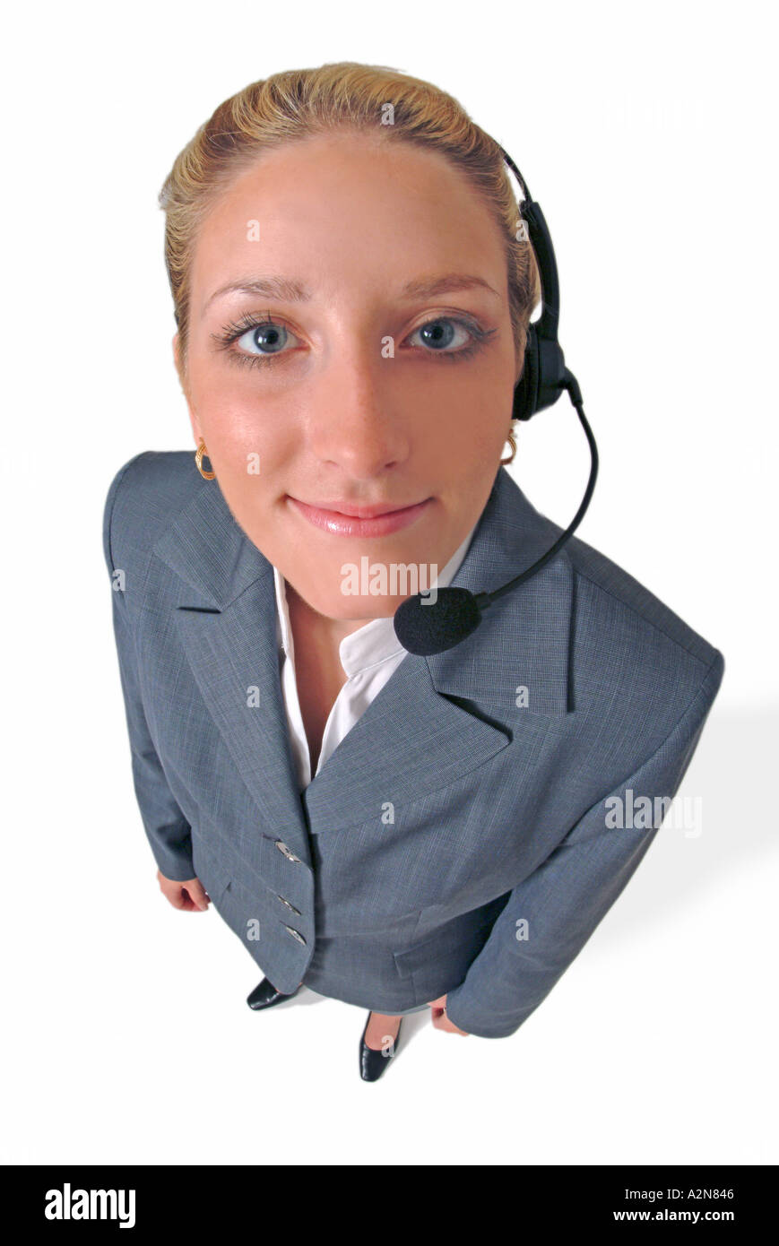 Businesswoman in business suit standing on white background Stock Photo ...