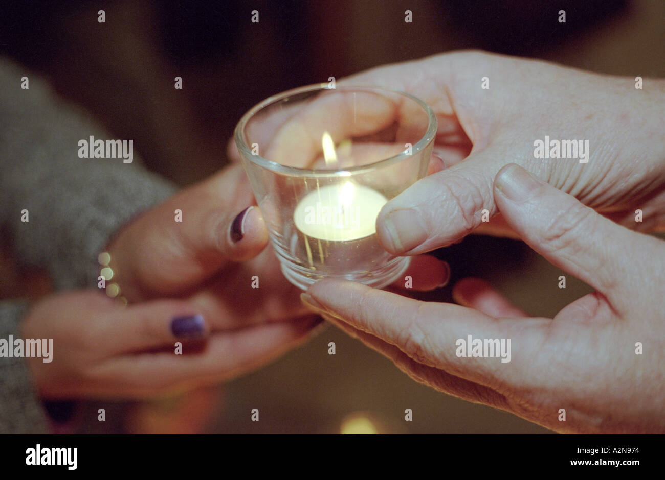 Holds two candles hires stock photography and images Alamy