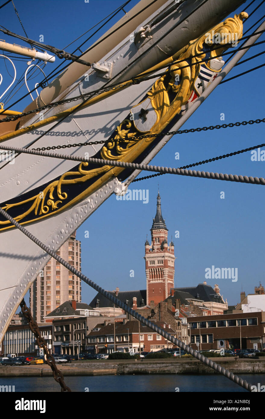 Ship's bow with city hall in background, Nord, Nord-Pas-de-Calais, France Stock Photo