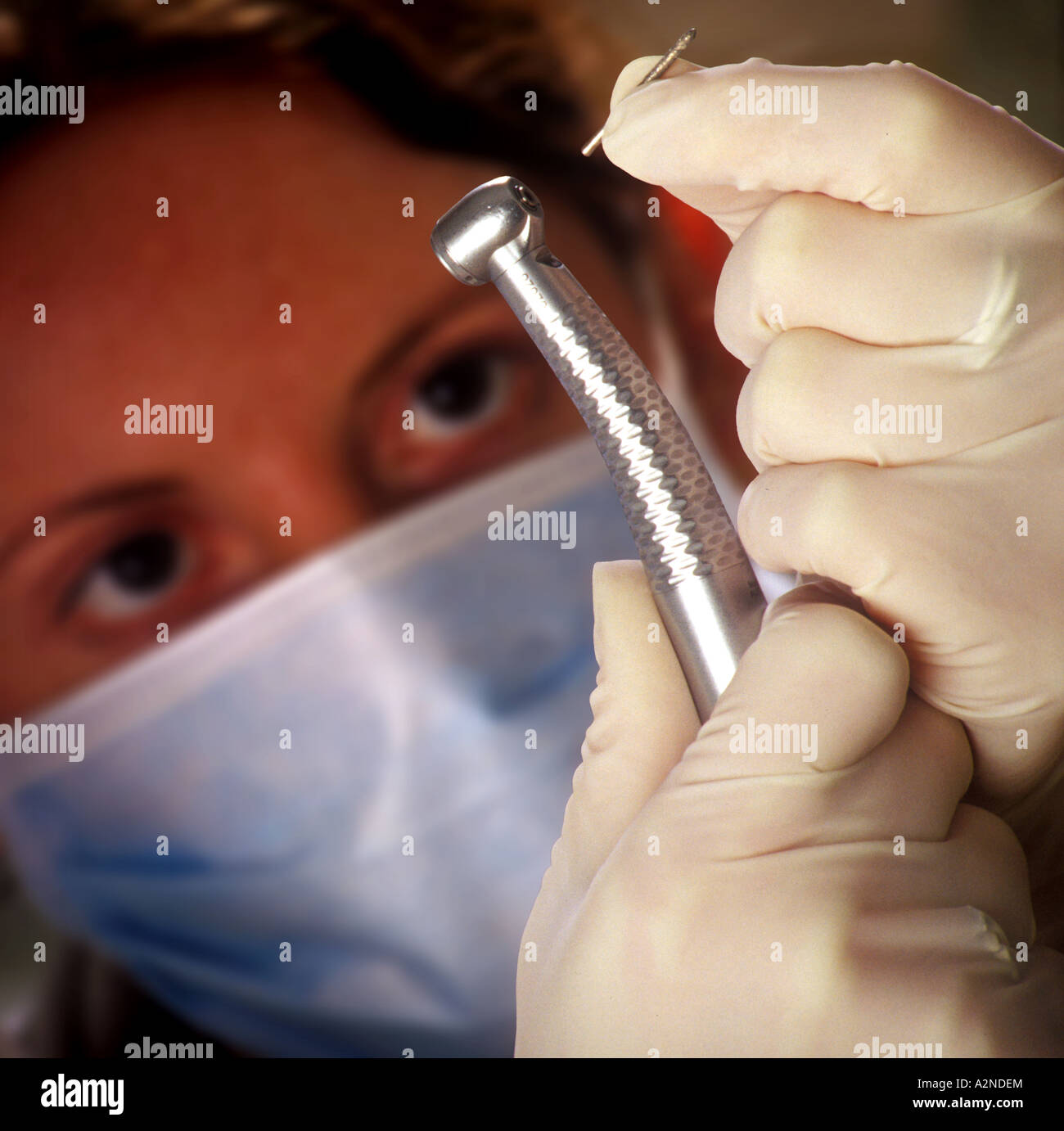 A dentist prepares a drill before performing a filling. Picture by Jim