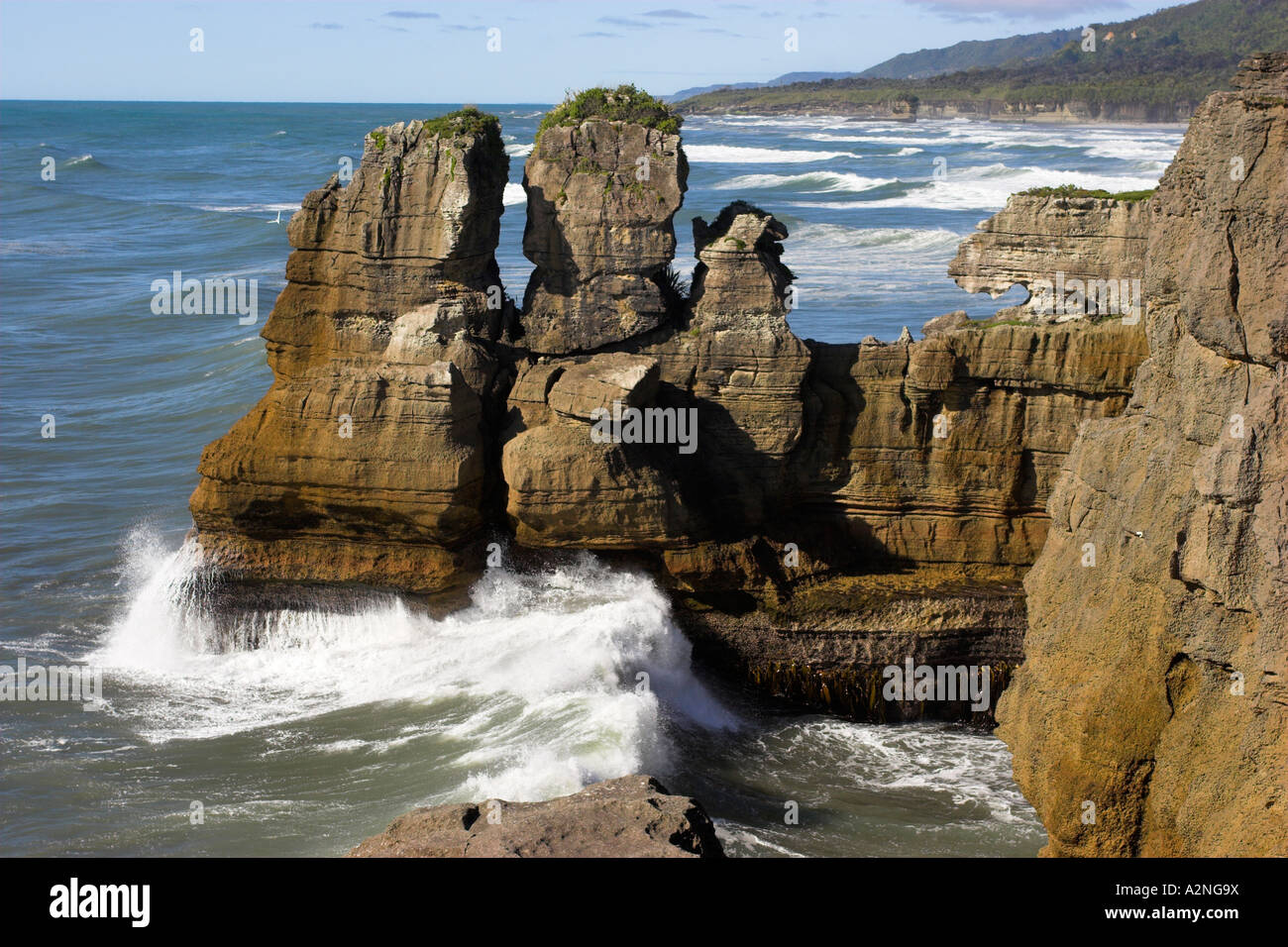 Rock formations near to the Pancake rock blowholes in the Punakaiki region on South Island, New Zealand. Stock Photo