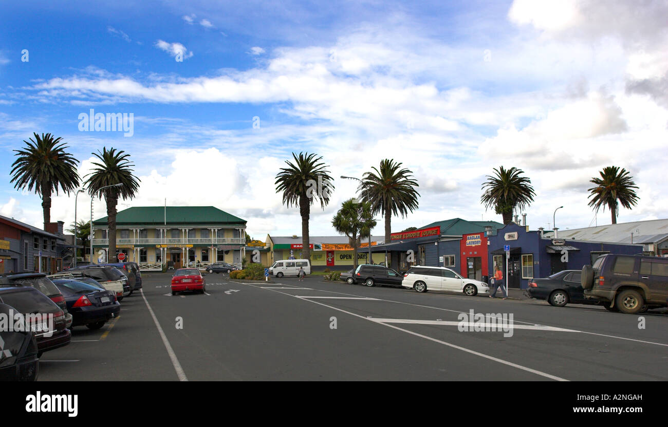 Main street at the entrance to the small town of Raglan on the west coast of the North Island, New Zealand. Stock Photo