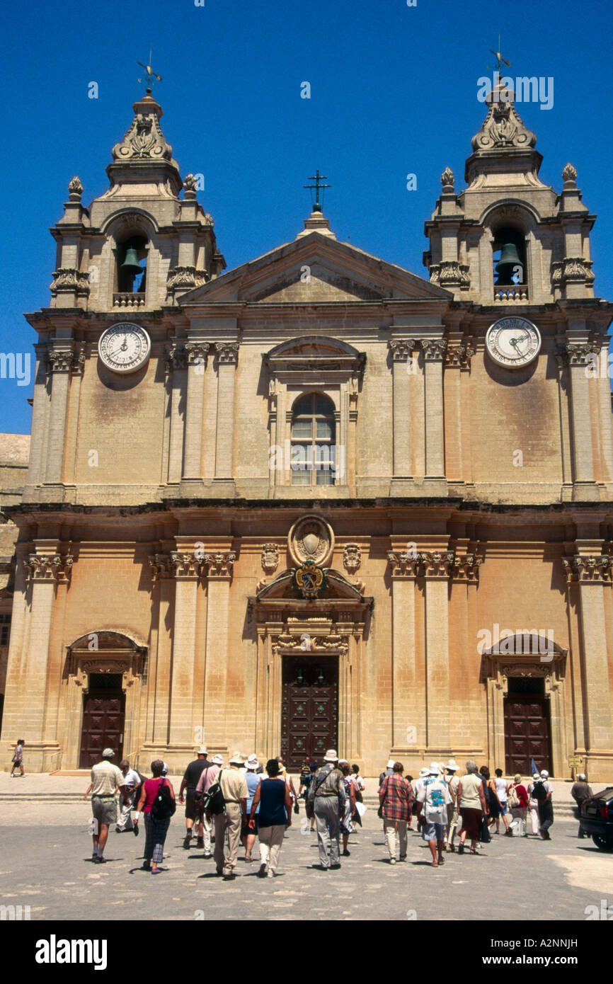 Tourists in front of cathedral St. Peter Cathedral St. Paul Cathedral Mdina Malta Stock Photo