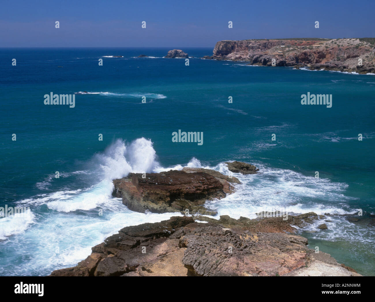 Waves crashing on rocks, Algarve, Portugal Stock Photo