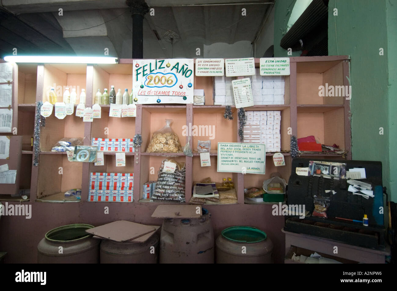 Half empty shelves inside a state owned food shop Havana Cuba Stock