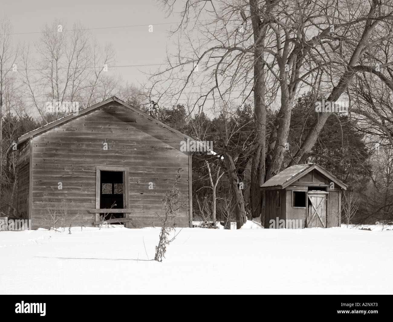 Winter landscape of outbuildings on a farm Stock Photo - Alamy