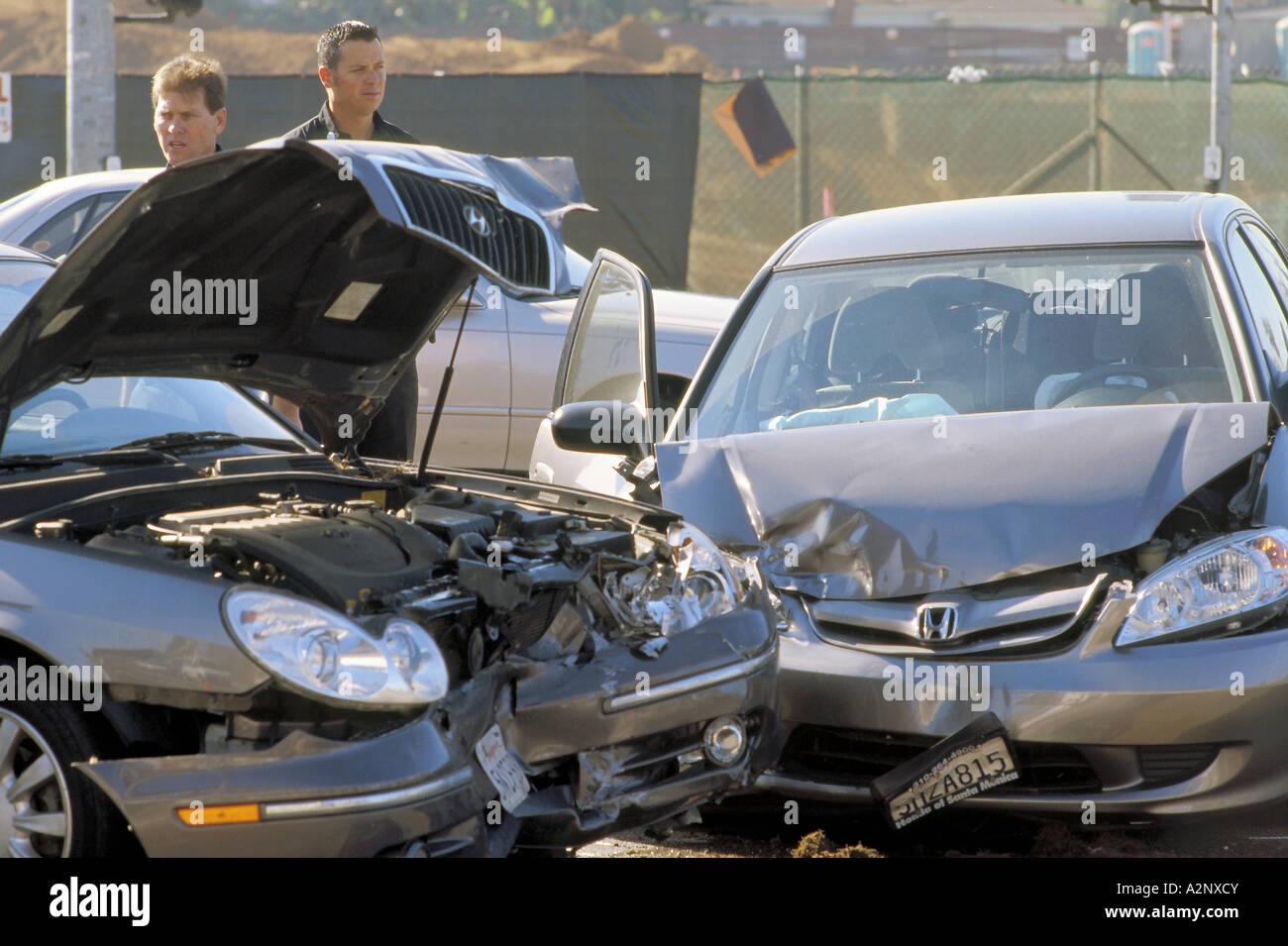 Front ends of two cars damaged after apparent red running incident at Lincoln Boulevard and Manchester Ave in Westchester, Los A Stock Photo