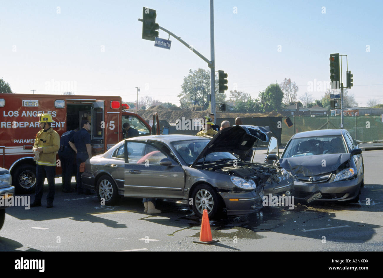 Front ends of two cars damaged after apparent red running incident at Lincoln Boulevard and Manchester Ave in Westchester, Los A Stock Photo