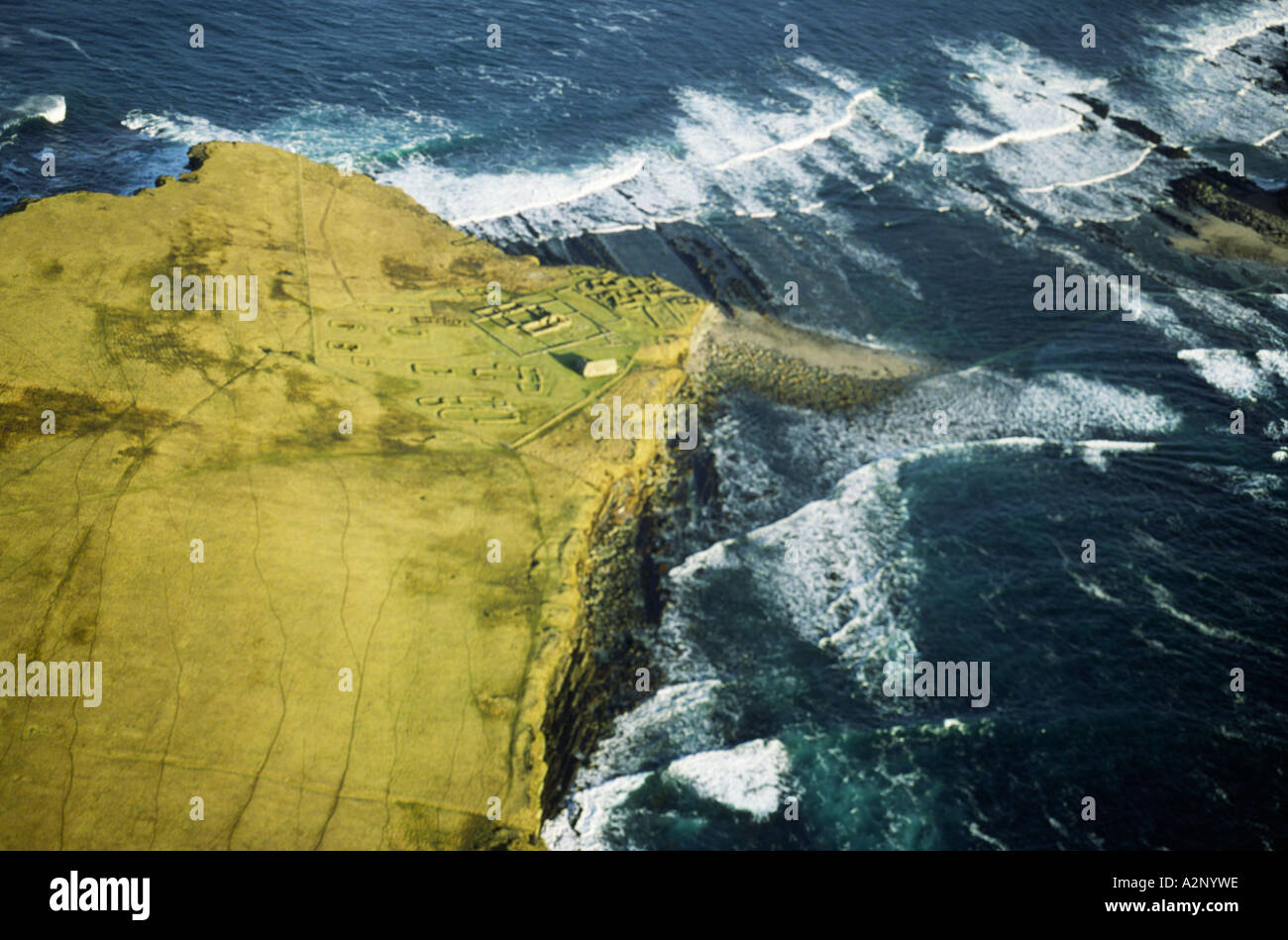 Aerial of east end of Brough of Birsay off Mainland Orkney N.W. coast. Ruins of Pictish and Norse settlement and tidal causeway. Stock Photo