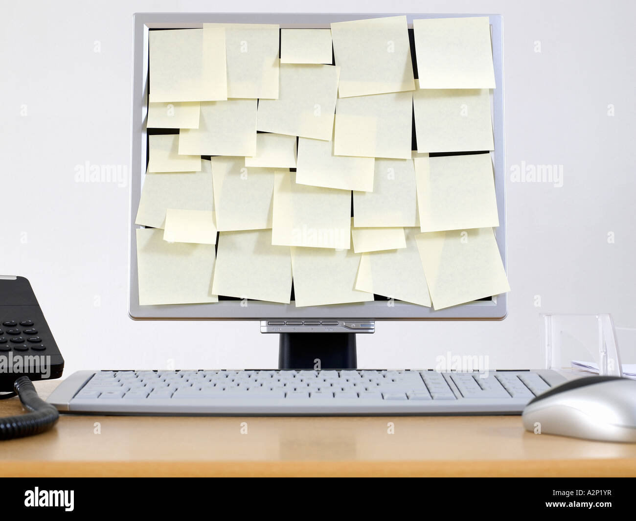 Computer monitor covered in adhesive notes Stock Photo Alamy
