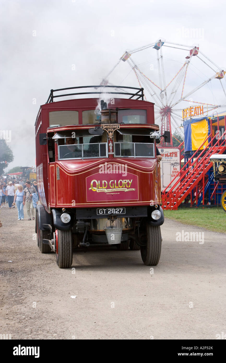 steam powered passenger bus at Pickering steam fair in Yorkshire Stock Photo