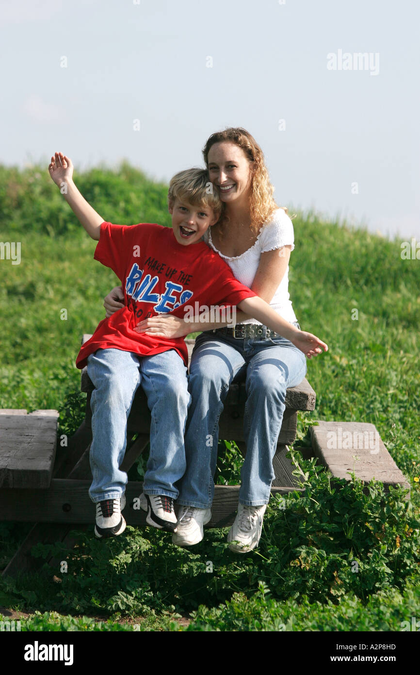 A young mother with her child at the park. Stock Photo