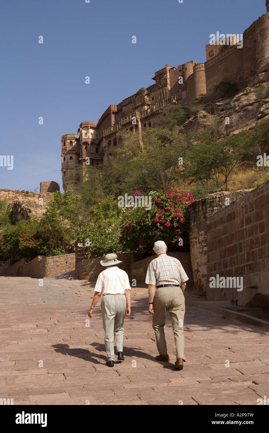 India Rajasthan Jodhpur elderly western visitors walking up to Fort Meherangarh Stock Photo