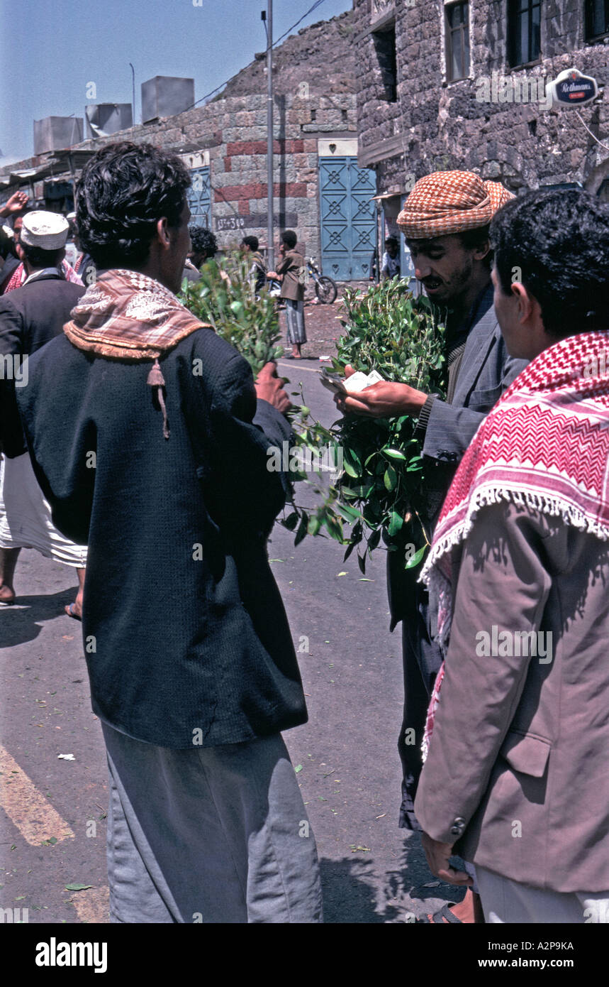 Yemen man buying his afternoon supply of qat Stock Photo
