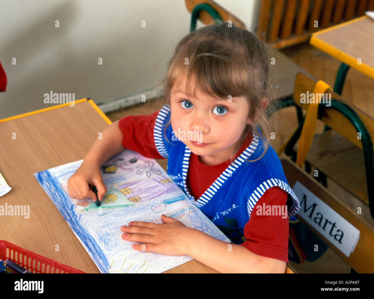 nursery school girl drawing kindergarten Stock Photo Alamy