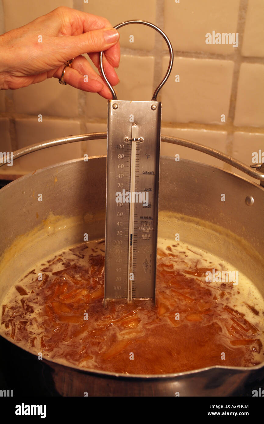Measuring The Temperature Of Sugar Boiling Or Caramel Syrop Through The  Various Candy Stages Stock Photo - Download Image Now - iStock
