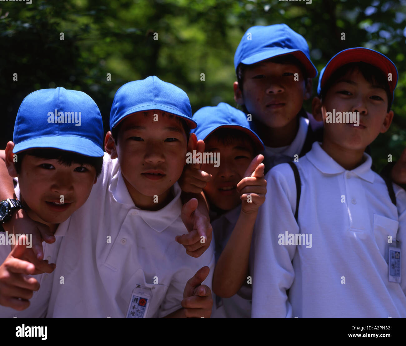 Japanese Elementary School boys visiting Kinkakuji temple Stock Photo