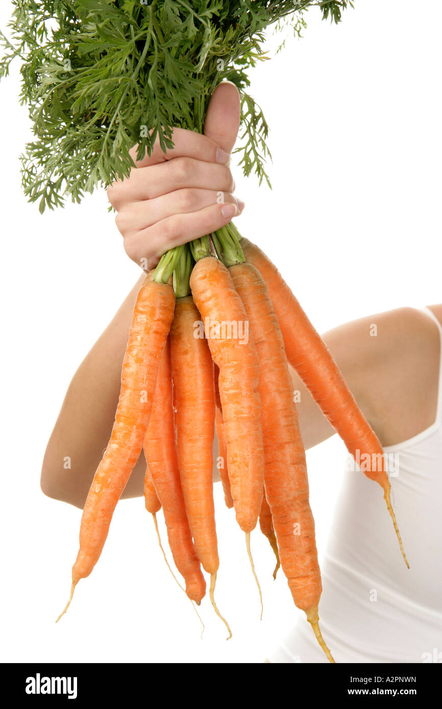 Human hand holding half orange hi-res stock photography and images - Alamy