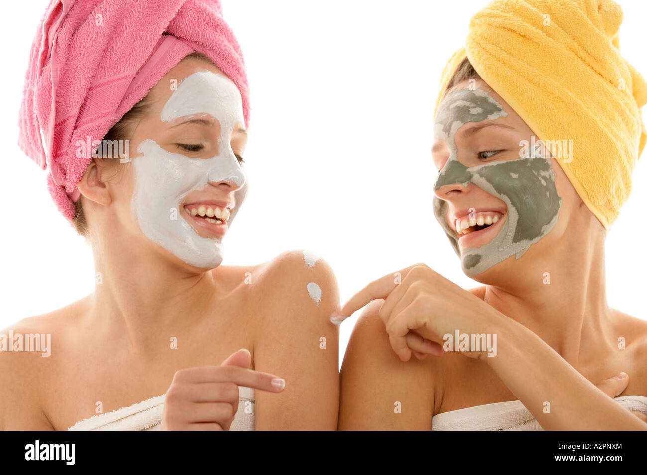 Two young women wearing masks Stock Photo - Alamy
