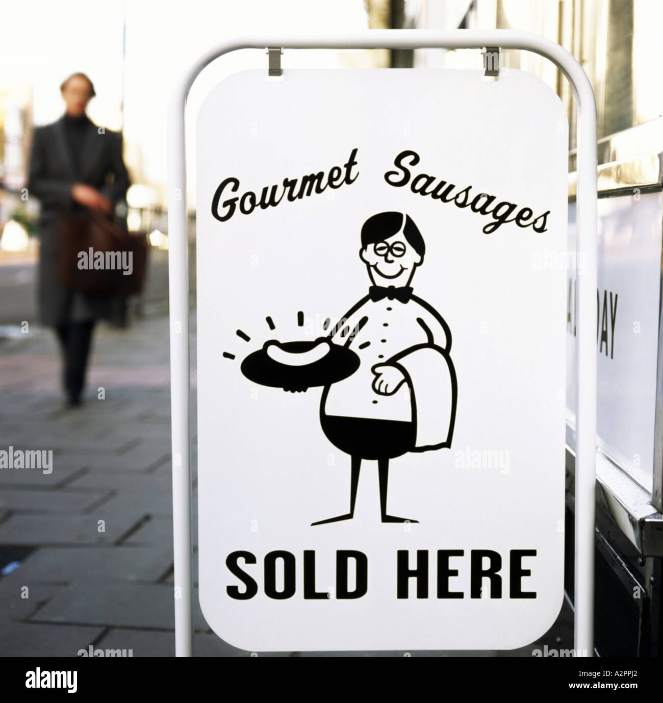 old fashioned sign for gourmet sausages outside sausage and mash, s & m
