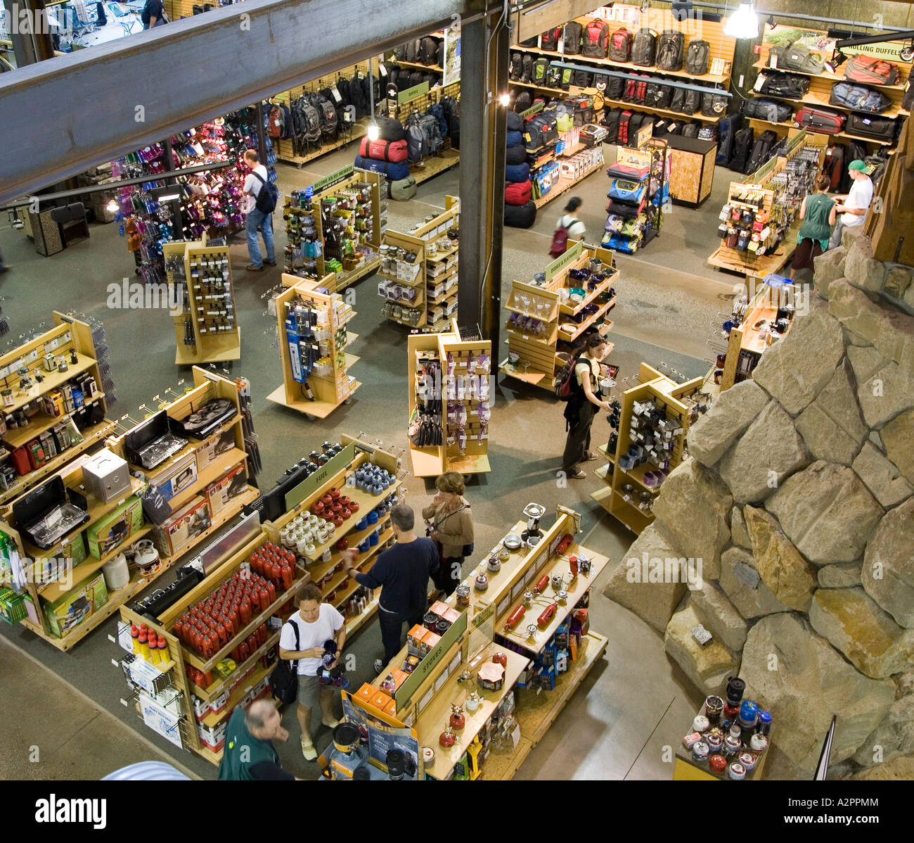 Customers looking at goods in outdoor supplies store REI Seattle USA