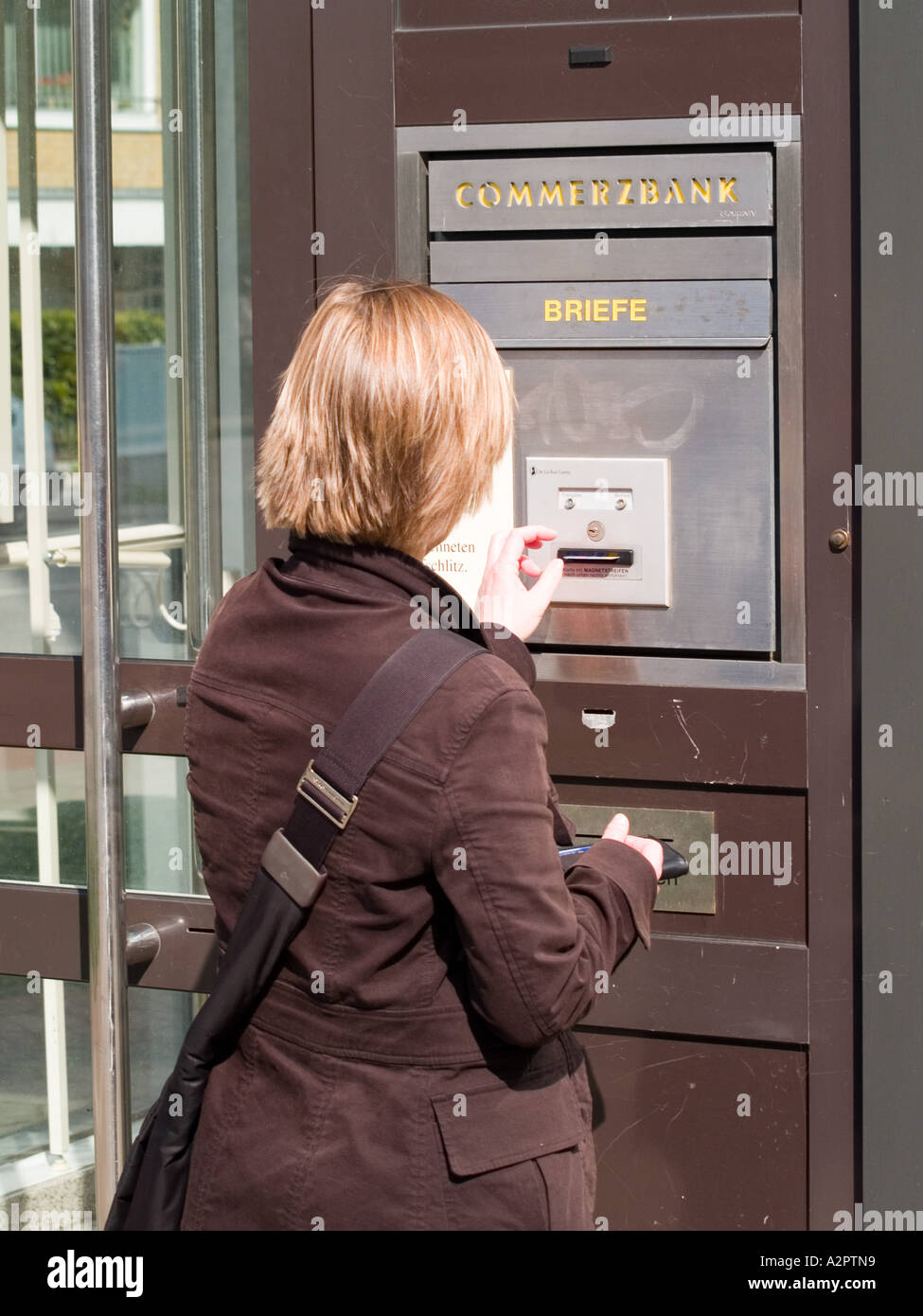 Woman Open Bank Door With Credit Card Stock Photo 6043736
