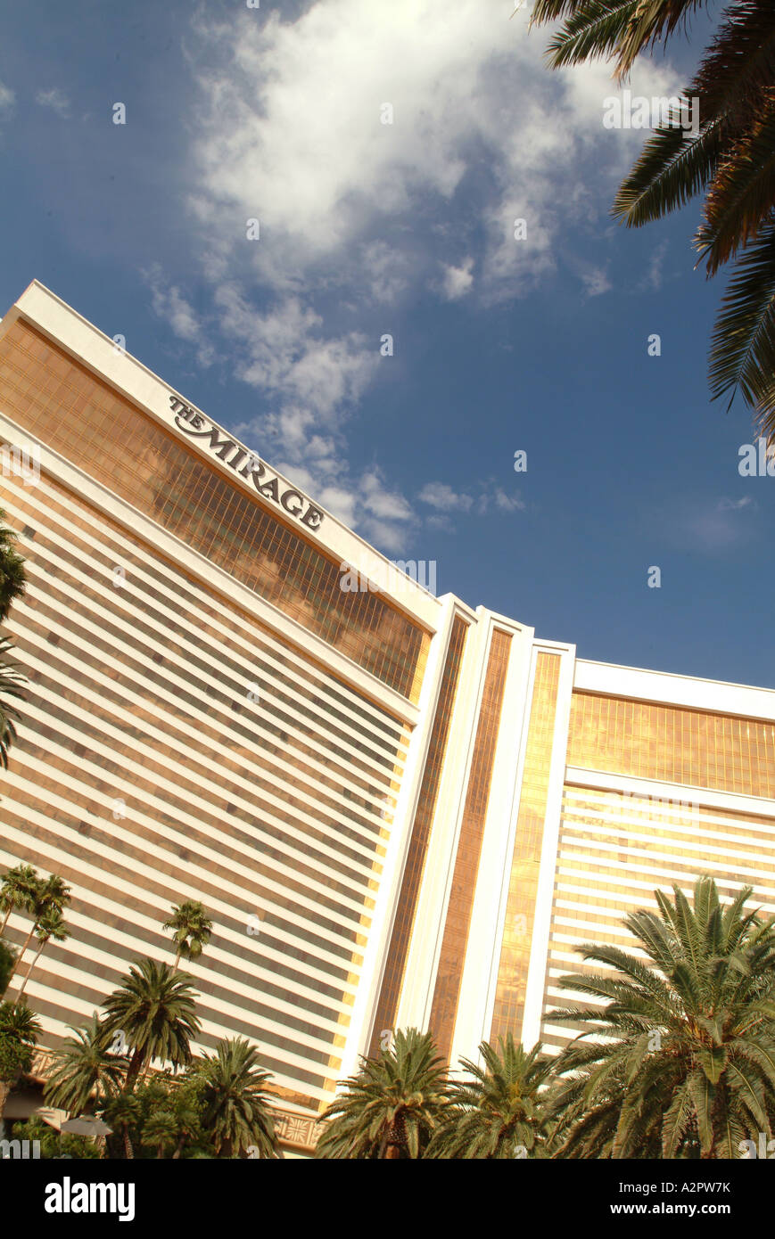 Sunny skies reflect off the gold tinted glass of the MGM Mirage Hotel Stock Photo