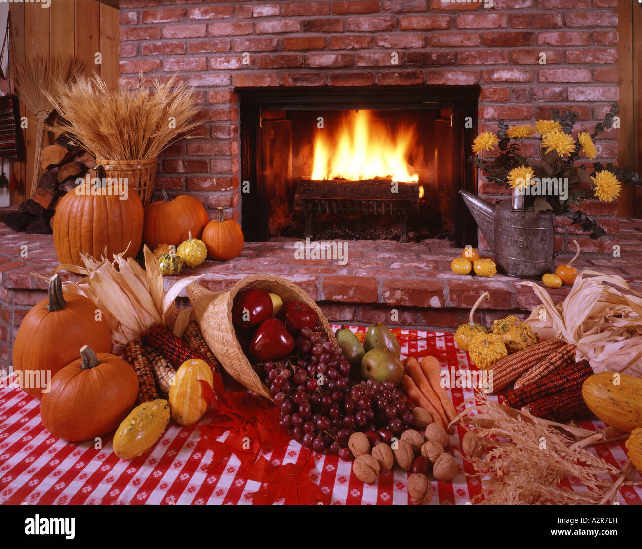 Harvest still life with seasonal fruits and vegetables in front of a ...
