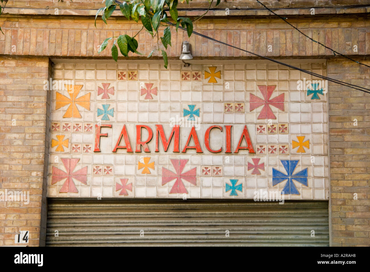 Spanish Farmacia shops in seville Maltese Stock Photo