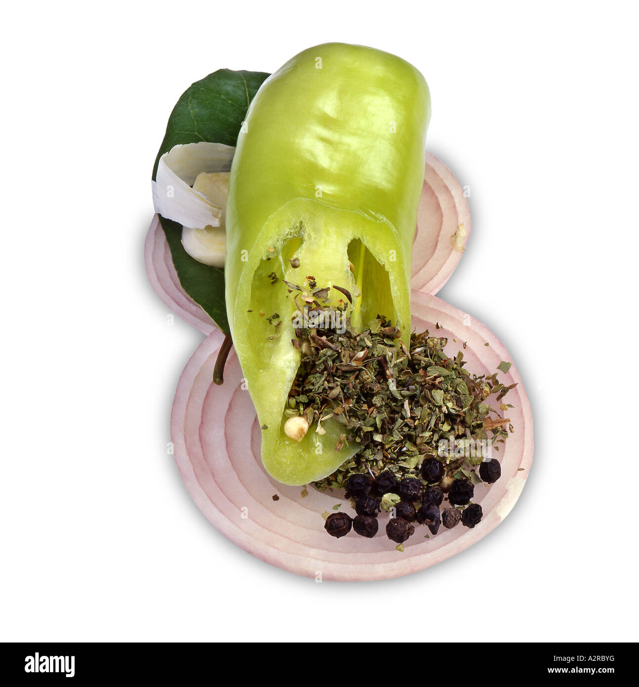 Green pepper, onion rings, oregano and black pepper grains Stock Photo