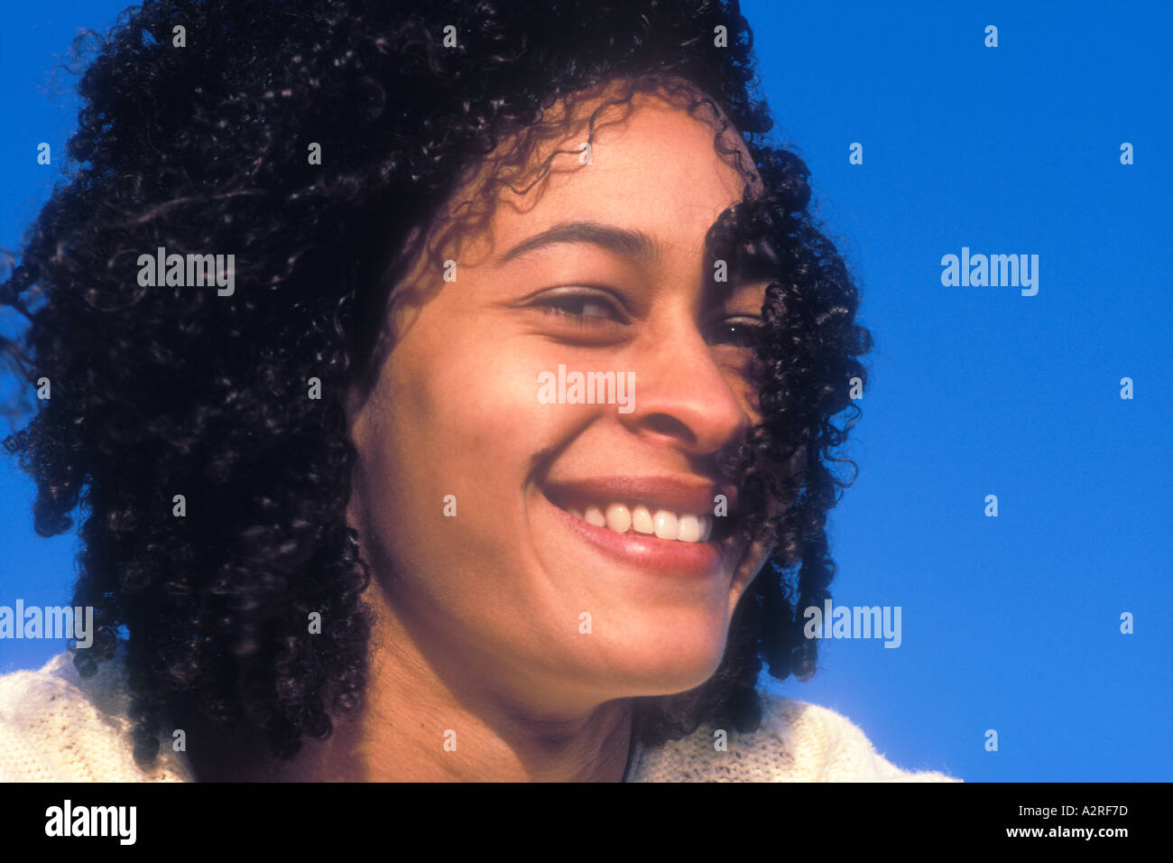 Portrait of smiling mixed Caucasian African American female Stock Photo