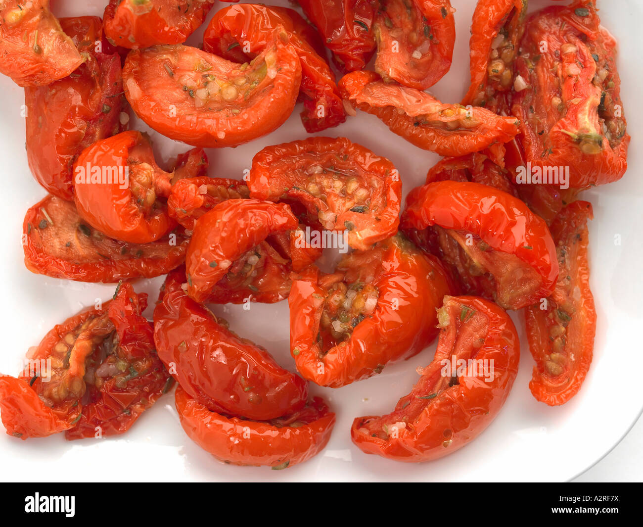 plate of sun blushed tomatoes Stock Photo - Alamy