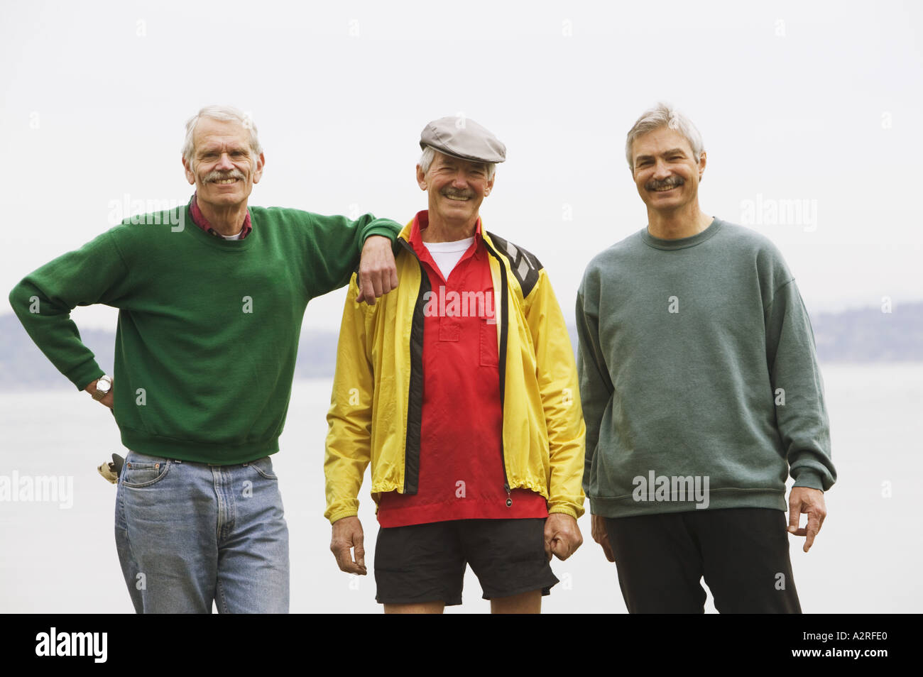 Portrait of three healthy middle aged men Stock Photo