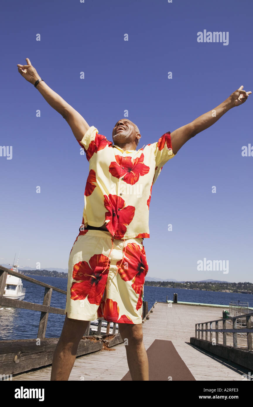 Middle aged man making the peace sign Stock Photo