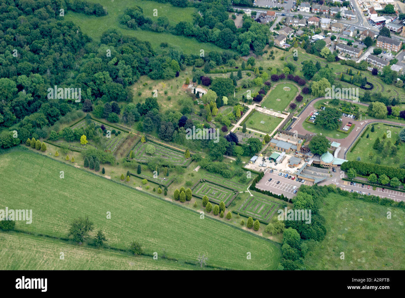 Oblique high level aerial view north of Ruislip Common with The Lodge