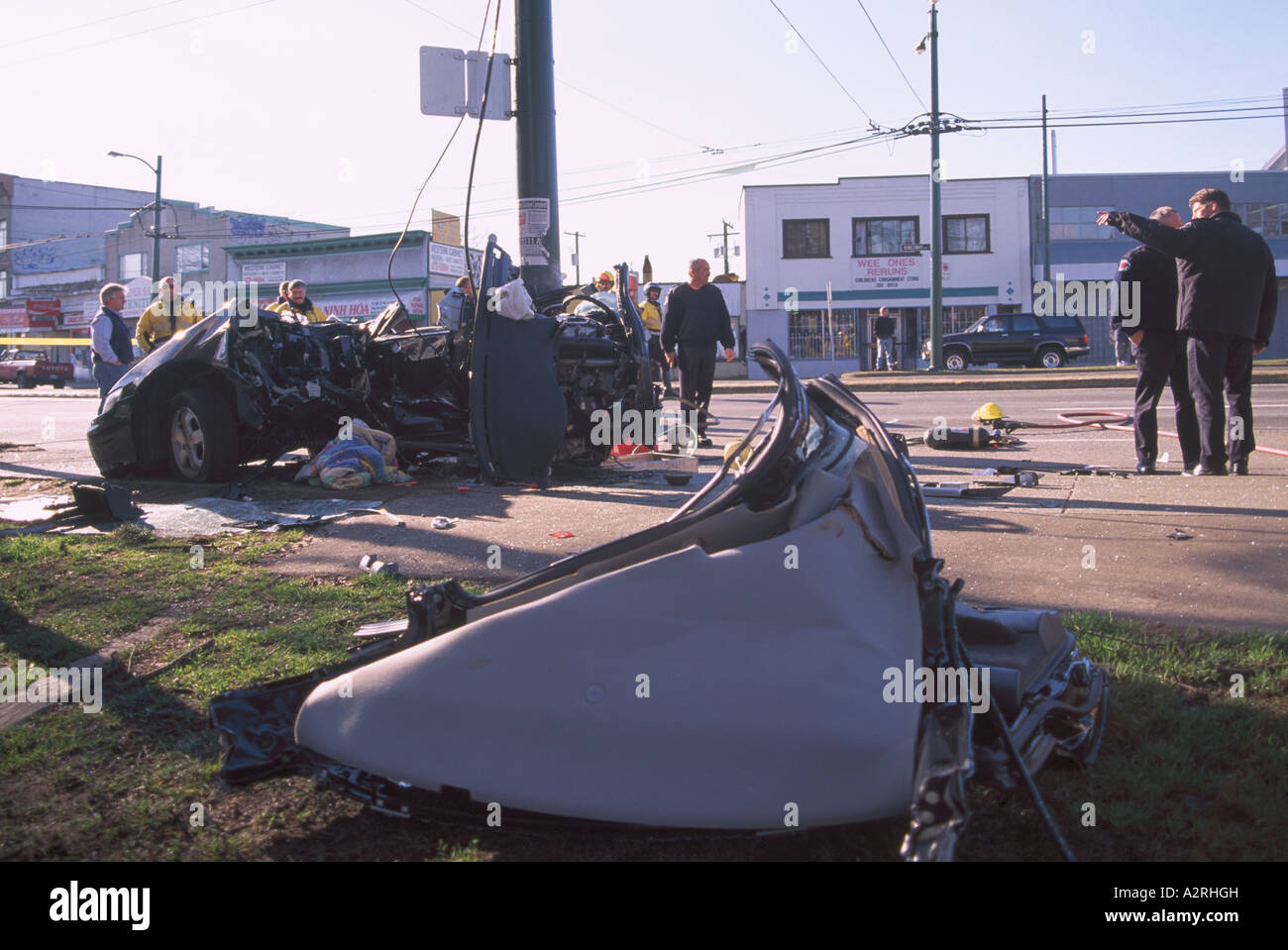 Police investigate Fatal Car Crash Traffic Accident Scene of Speeding Teenage Driver into Pole Vancouver British Columbia Canada Stock Photo
