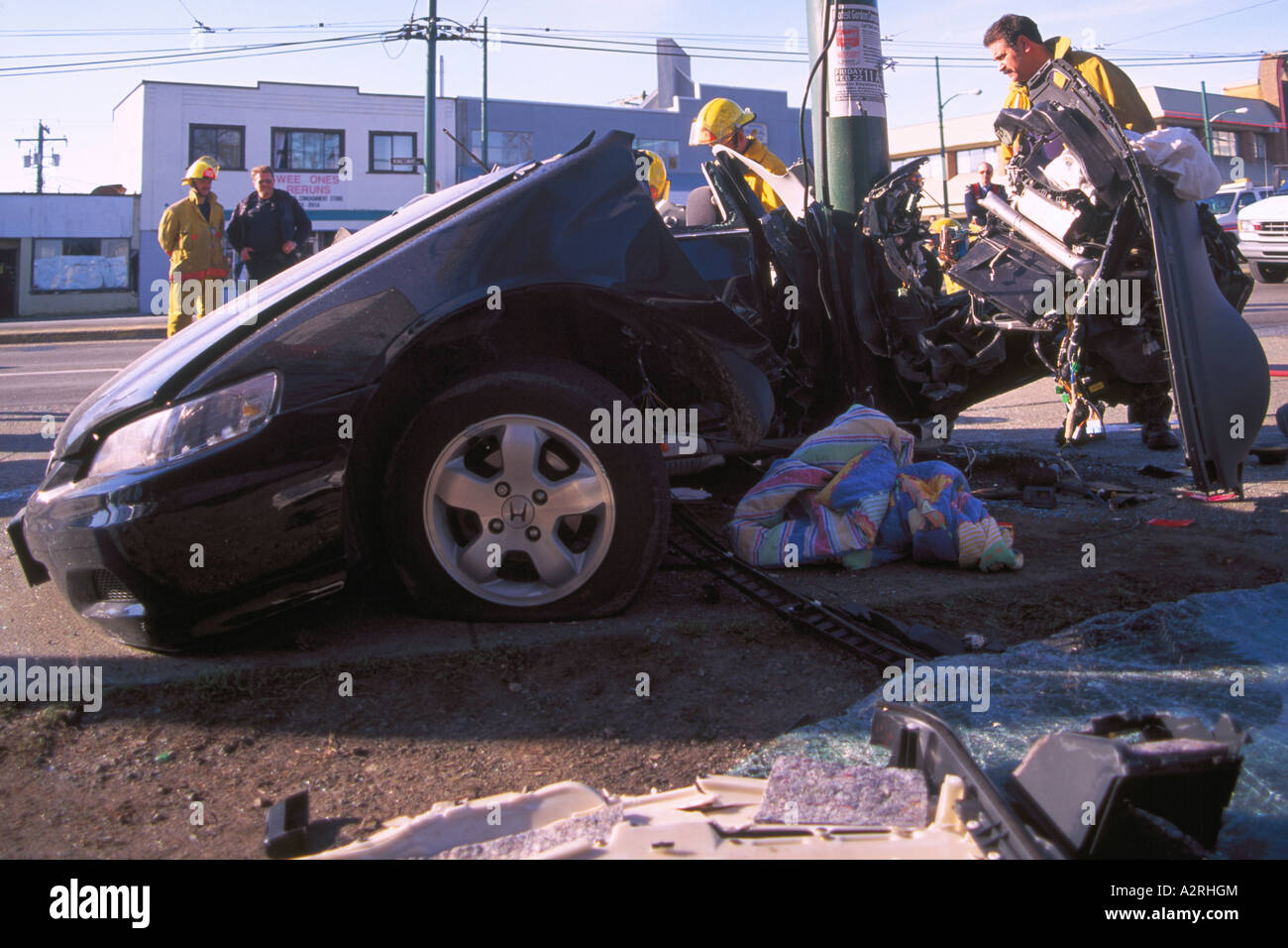 Police investigate Fatal Car Crash Traffic Accident Scene of Speeding Teenage Driver into Pole Vancouver British Columbia Canada Stock Photo