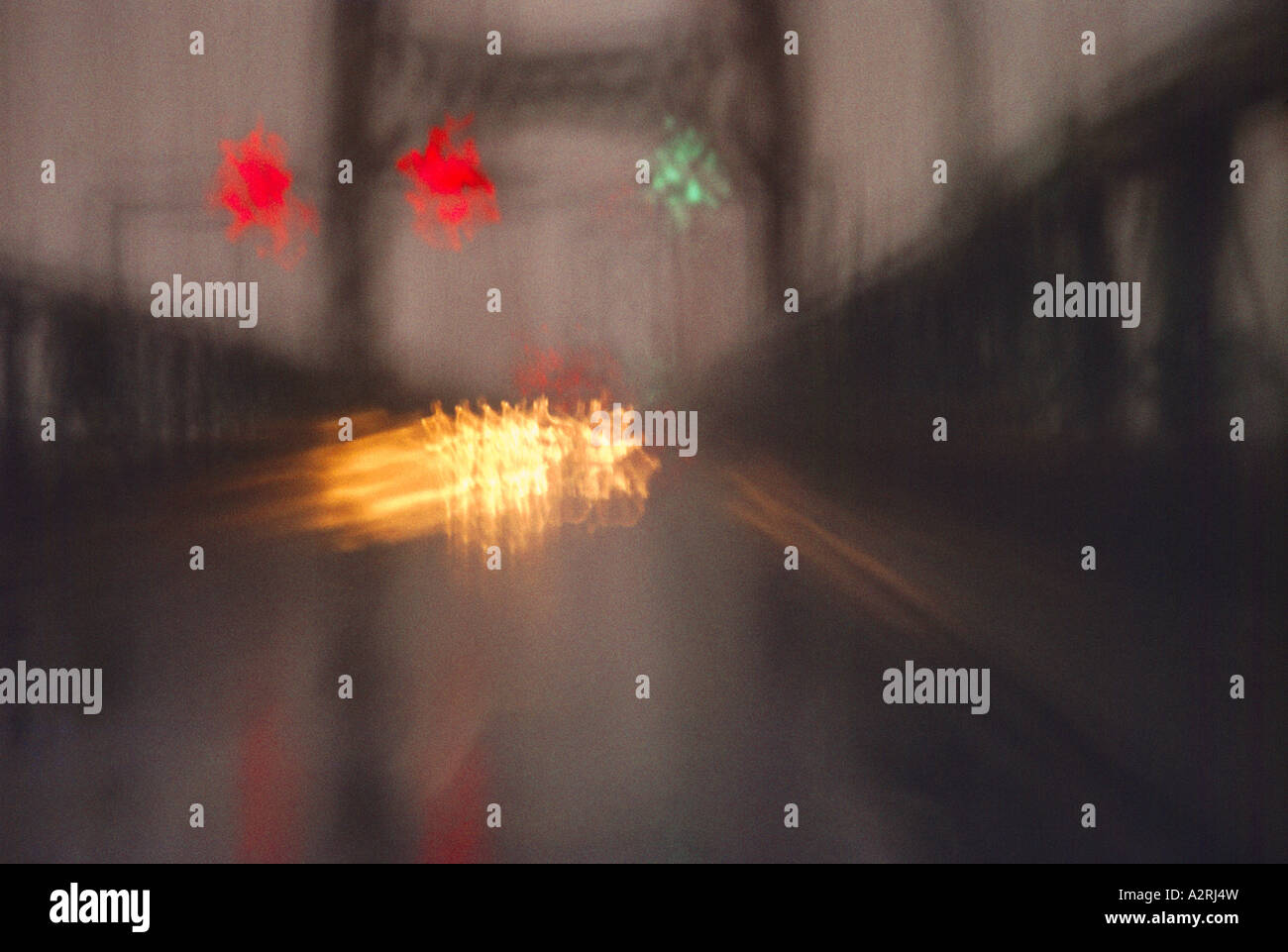 Motion Blur, Blurred Traffic and Lights on Bridge, Out of Focus Abstract on a Dark Rainy Night, Creative Concept Stock Photo