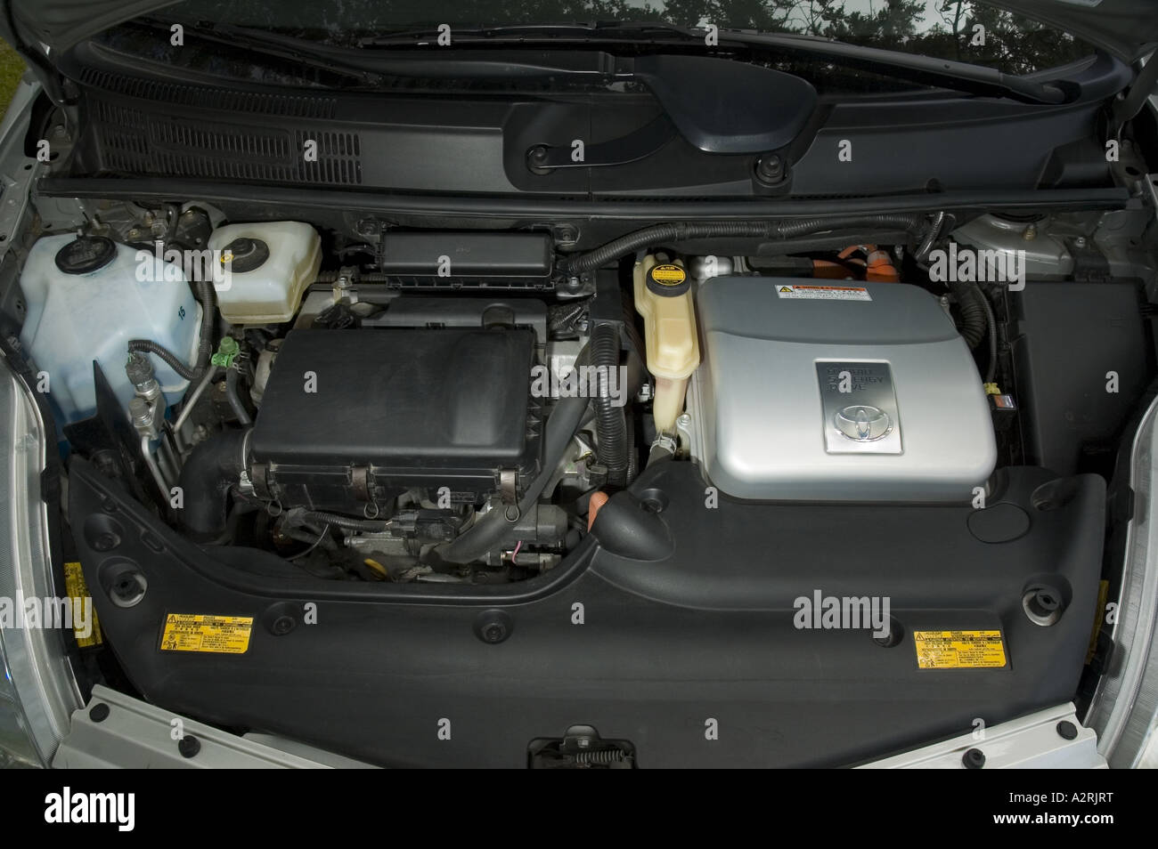 ENGINE IN 2004 TOYOTA PRIUS GASOLINE-ELECTRIC HYBRID CAR Stock Photo