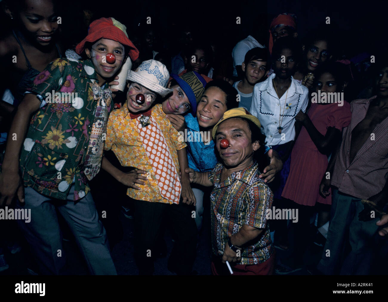 satiago carneval cuba dwarf and children in red noses Stock Photo